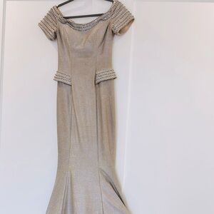 Party dress 
thick material will fit body curves perfectly
Size 6, stretchy,